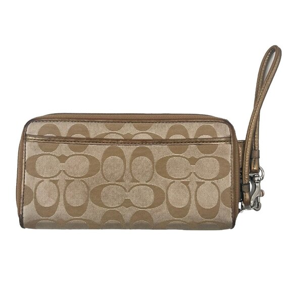 Coach Handbags - Coach Gold Signature C Logo Zip Around Wristlet Wallet